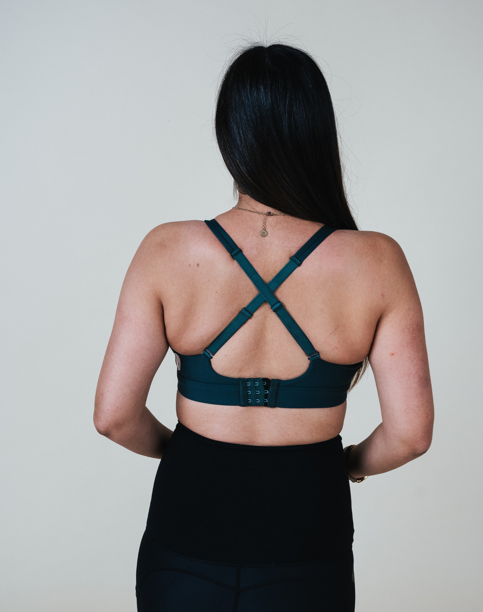 Back view of maternity nursing bra in dark green 