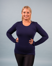 happy, fit mother wearing long sleeve blue bamboo top