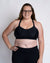 Breastfeeding mum wearing a plus cup size nursing bra in black