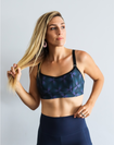 Active mother wearing maternity high support sports bra