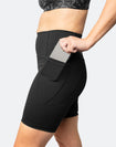 Pocket functionality of black postpartum bike shorts