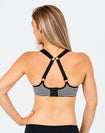 mum in a striped nursing sports bra for high impact with option to wear as a racerback