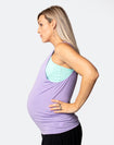Side view of pregnant mother wearing maternity activewear