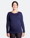 Pregnant mother wearing a blue long sleeve breastfeeding top