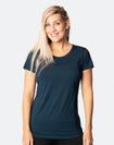 Happy, fit Mum showing the nursing zip functionality of Cadenshae Bamboo Workout Tee