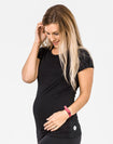 pregnant active mum wearing a black breastfeeding t-shirt